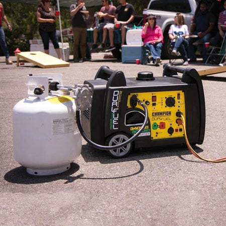 Champion Dual Fuel Inverter Generator running on propane at an outdoor event